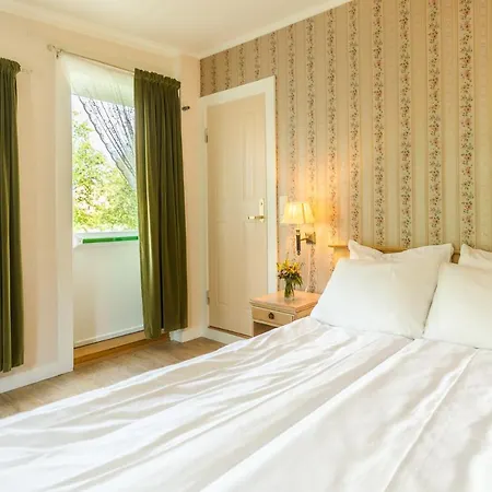 Fru Haugans Hotell 4*